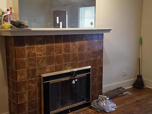 Living room , with electric fire place.