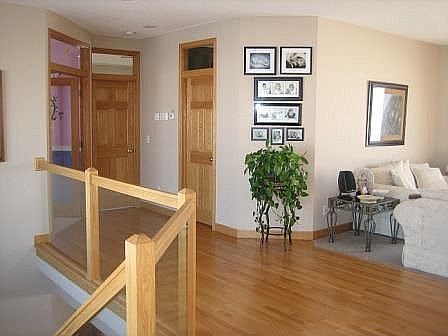 Glass paneled staircase! Transom Windows!