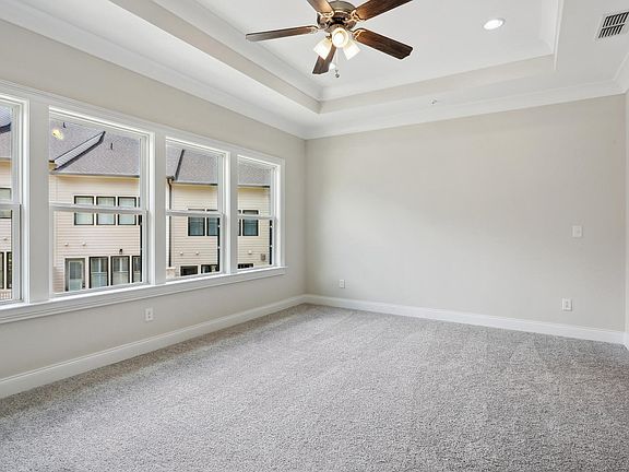 Master bedroom with tray ceiling
