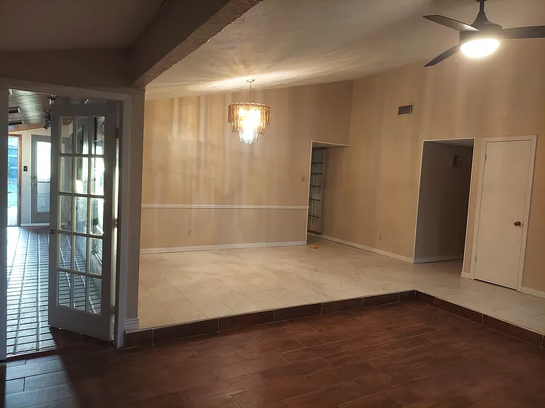 Formal living, dining and office space or TV room
