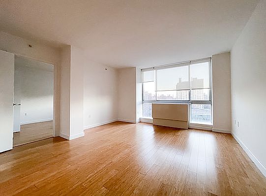 1st image of 310 E 2nd St APT 9J