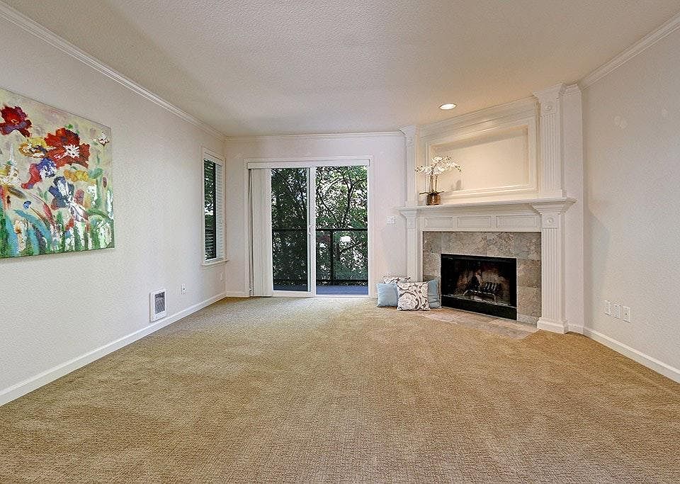Spacious, elegant living room with peaceful deck