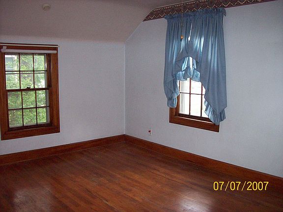 MASTER BEDROOM WITH HARDWOOD FLOORS