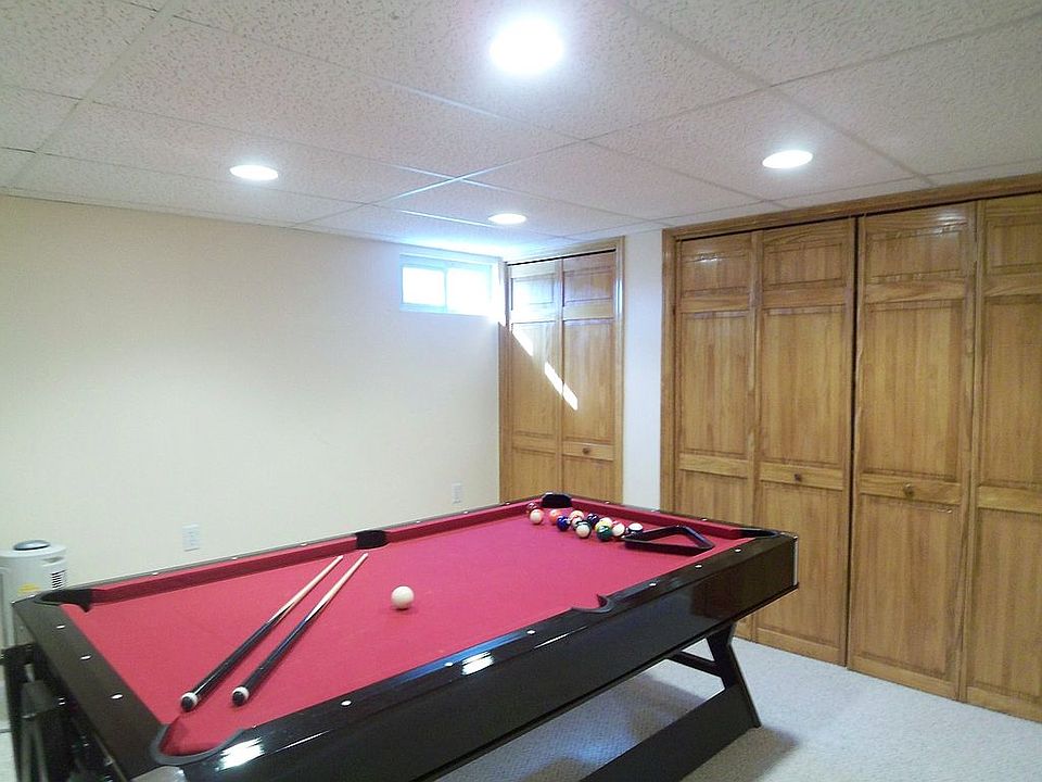 Game Room w wall to wall closet storage