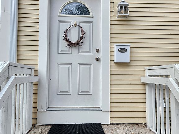 Your private entry. Directly inside is a landing with W/D hookups and interior stairs up to your interior front door which opens to the living room.