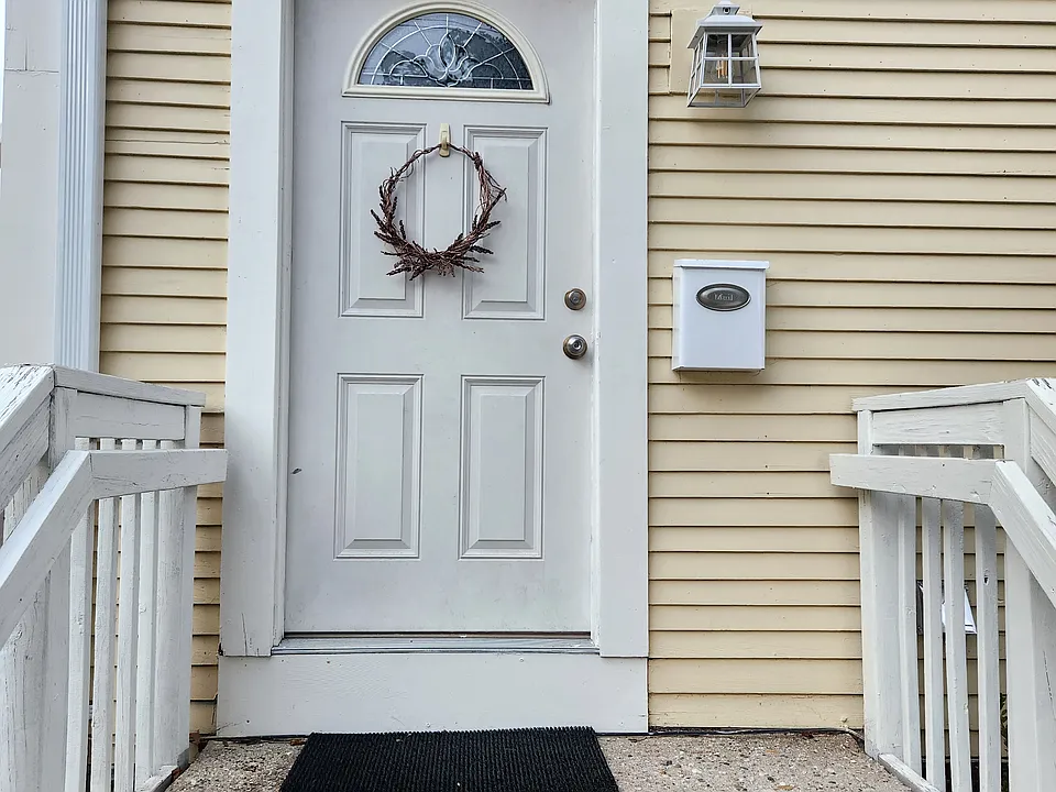 Your private entry. Directly inside is a landing with W/D hookups and interior stairs up to your interior front door which opens to the living room.