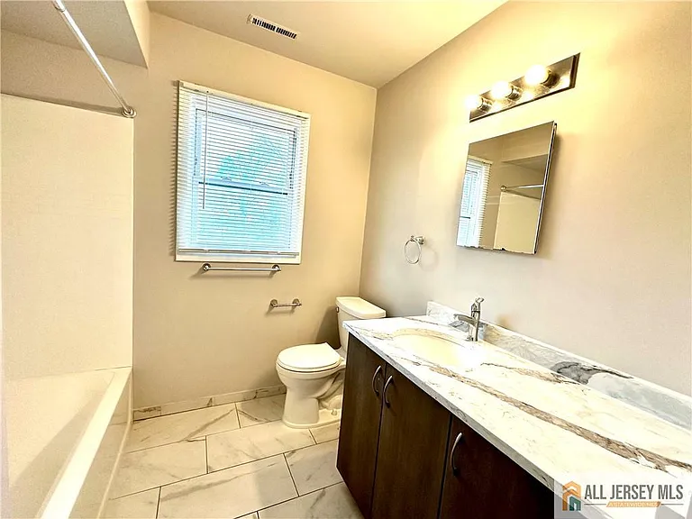 909 Hermann Rd — Photo 7