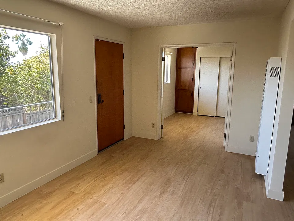 Living Room and adjacent Den/Office