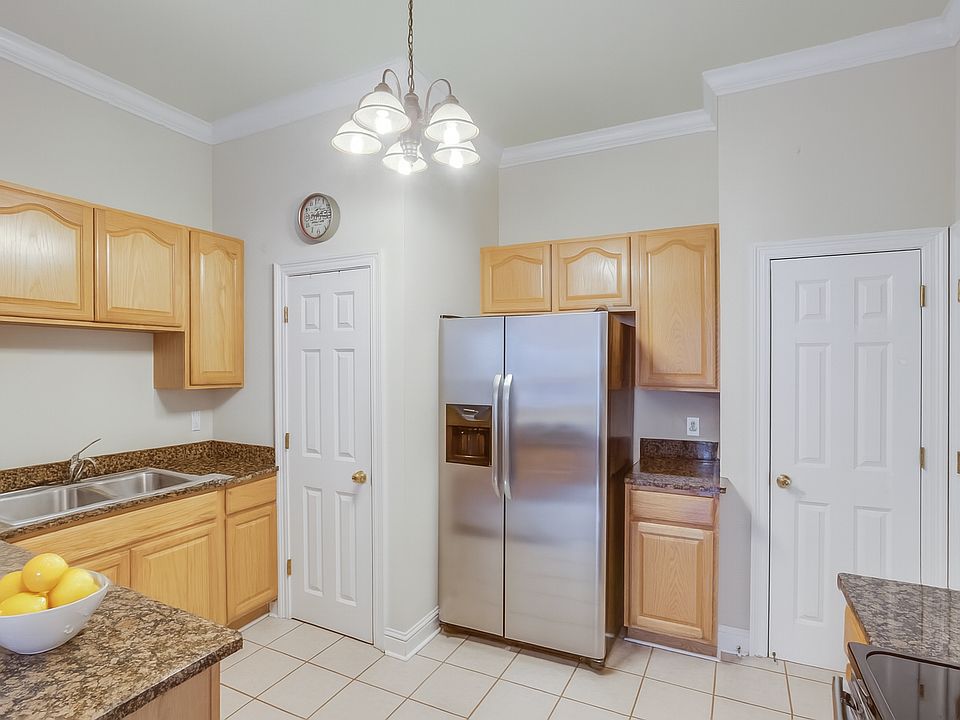 Large kitchen with multiple pantries