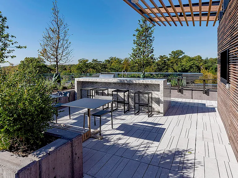 Apartment community outdoor grilling station at Griffis Edgemoor in Bethesda, Maryland.