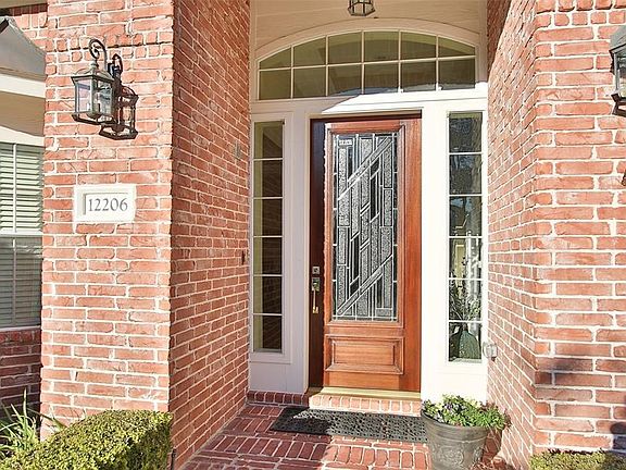 Make your way into this rare one story through the hardwood and glass door that has been recently refinished.