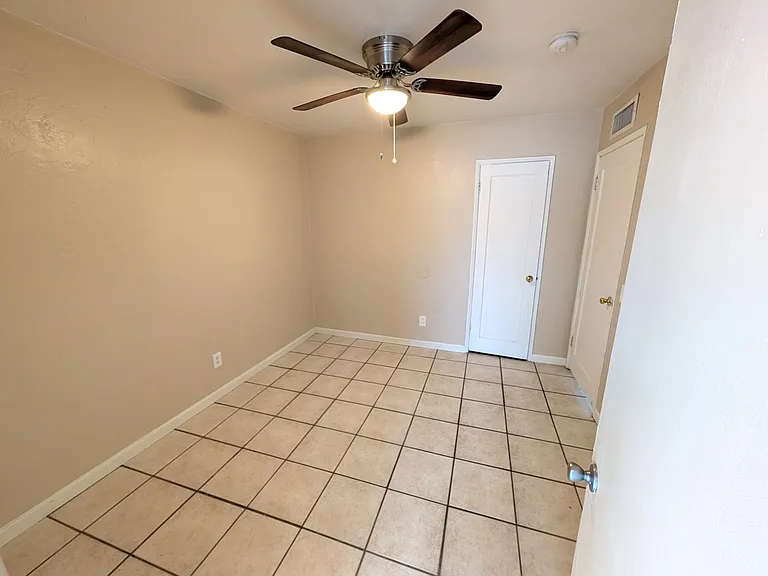One of three bedrooms