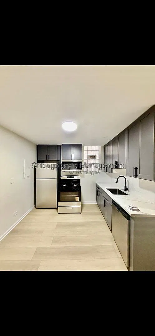 7831 S Colfax Ave — Photo 1
