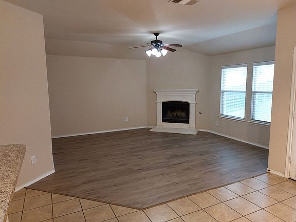 Recent new luxury vinyl plank flooring in living room and all bedrooms. No carpet in this beautiful home!