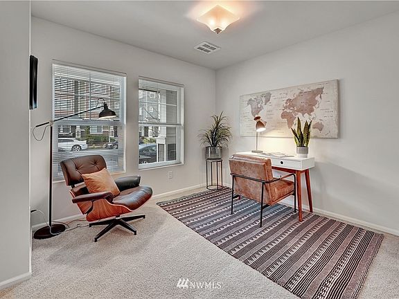 Den/office has plenty of natural light with two large windows