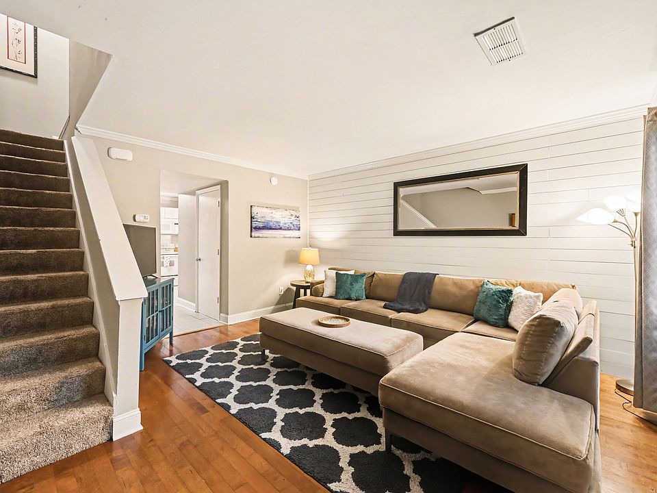 Living area with sectional sofa and Smart TV