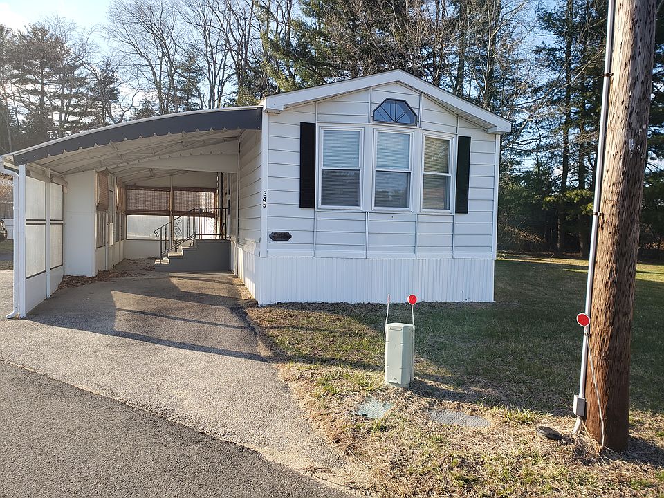 Front of House w/Car Port