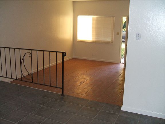 Tile living room, actually LIGHT-colored laminate in dining