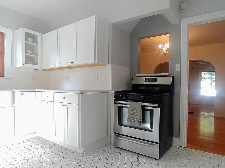 Tastefully updated Kitchen with new dishwasher, sink, counter tops, cabinets and floor.