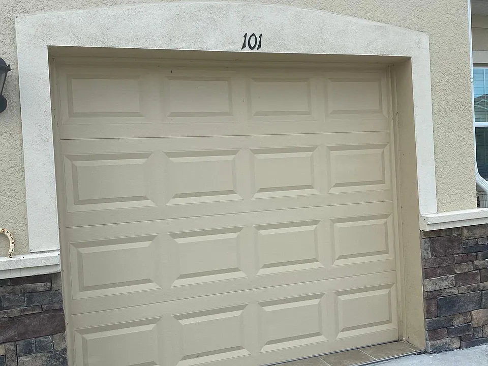2 parking spots in front of garage