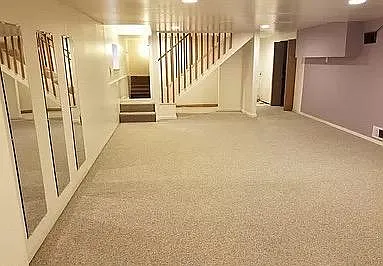Family/recreation room with adjacent sauna. Also adjacent are sixth bedroom, several large walk-in storage closets, shop and laundry area if tenant prefers washing machine and dryer to be located downstairs.