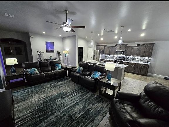 5 High end leather chairs with recling and head adjustment.