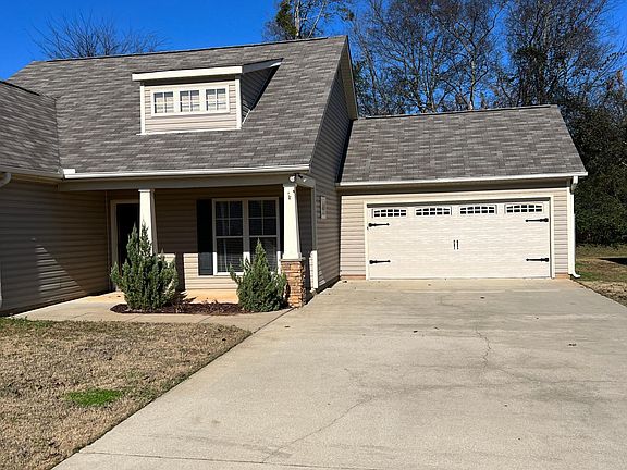 Two car garage & drive from street.