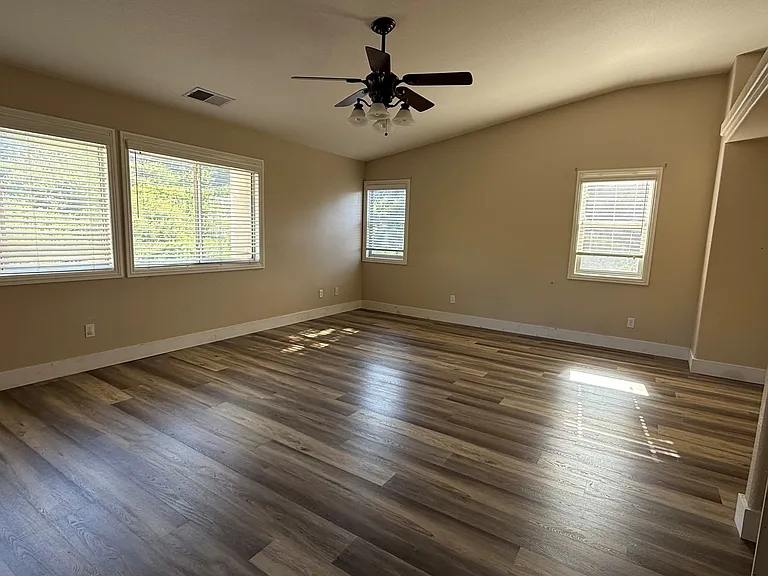 Large Primary bedroom. Approximately 20 by 16.