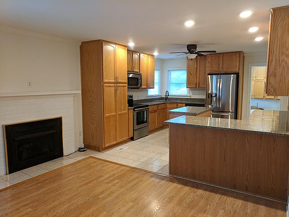 Kitchen & adjacent fireplace