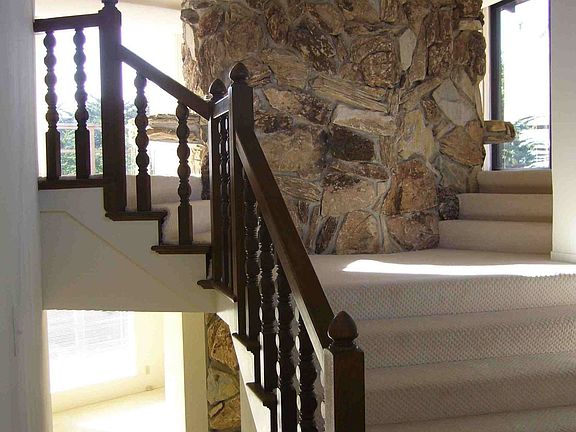 Entry way showing upstairs and downstairs living rooms.