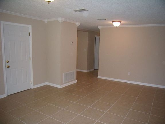 Neutral colors and impressive crown molding