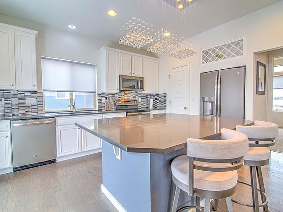 5th image of 18571 E 50th Pl