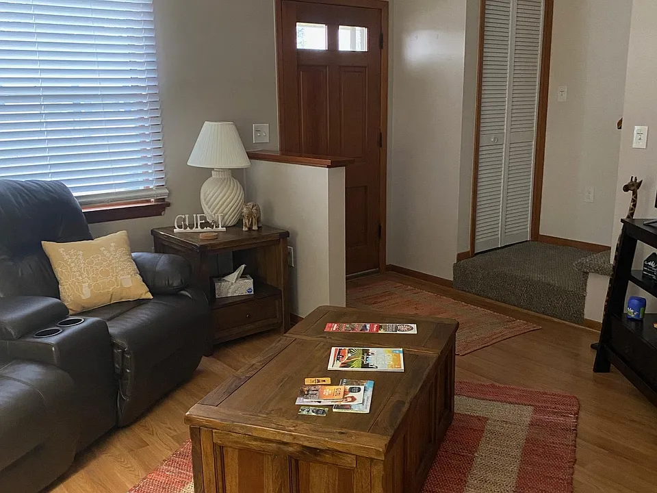 Living room furnished with furniture tables and TV