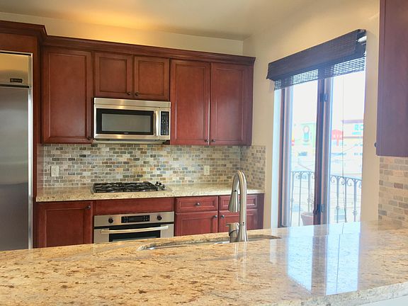 Opening to kitchen from dining 