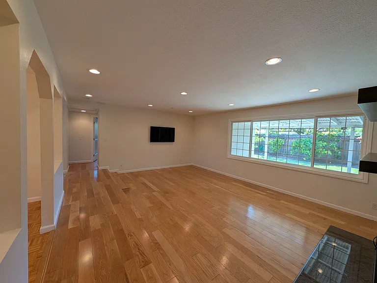 Living room facing towards back yard.
