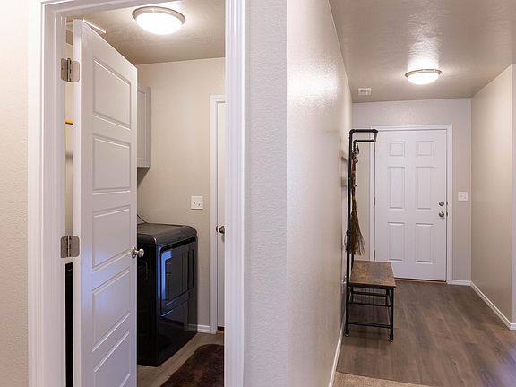entry and laundry appliances included
