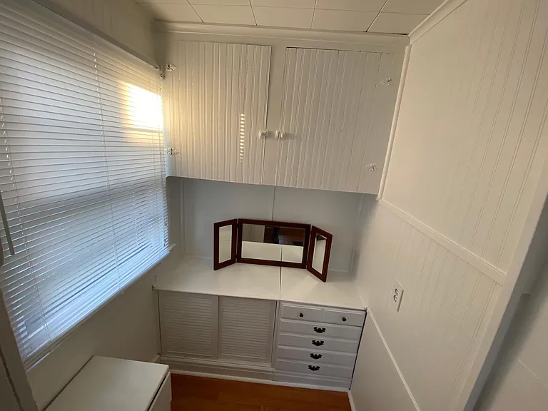 The walk-in closet window and built-ins.