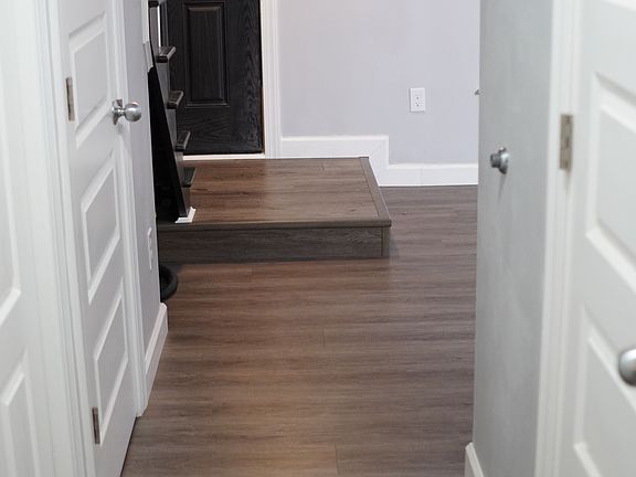 Downstairs Hallway, Laundry Closets, Utility Closets, Restroom.
