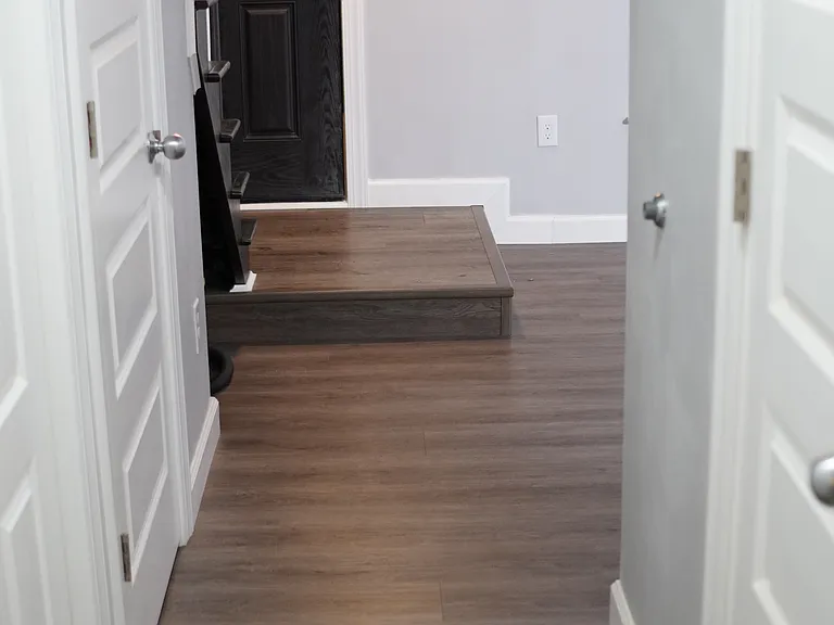 Downstairs Hallway, Laundry Closets, Utility Closets, Restroom.