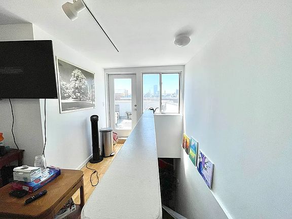3rd image of 319 E 8th St APT 6B