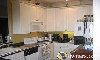 Kitchen with tall cabinets