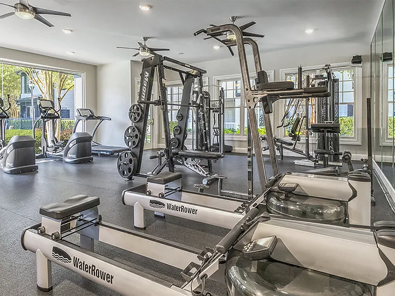 Also housed in the clubhouse is the 24/7 fitness center with free weights and cardio theater that overlooks the pool