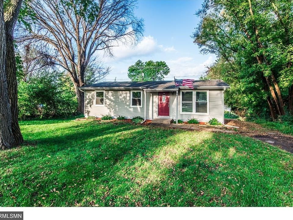 Large corner lot with mature trees.