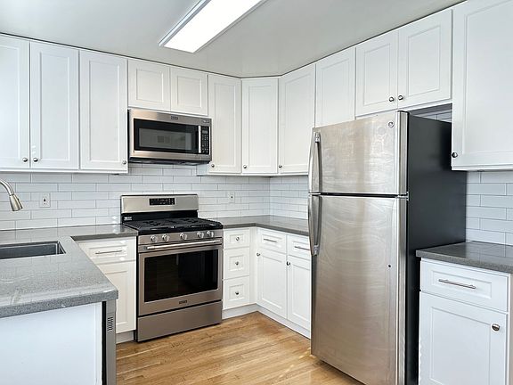 Stainless Appliances and Quartz Countertops