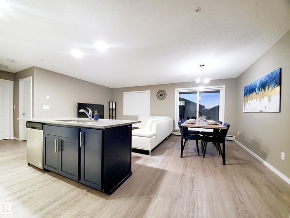 5th image of 394 Windermere Rd NW #204