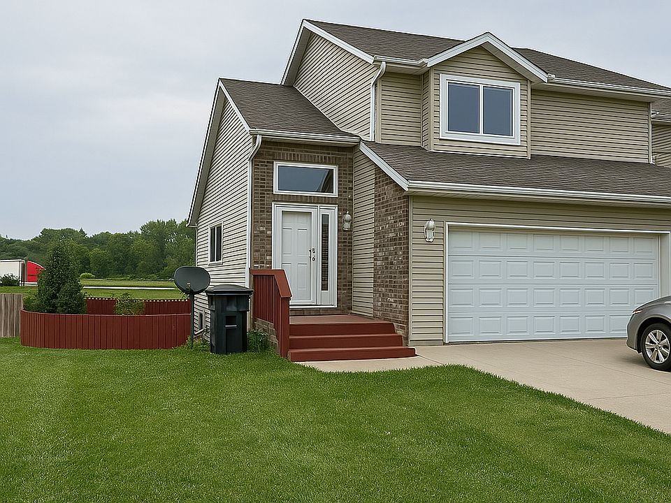 Front of house and driveway showing attached garage