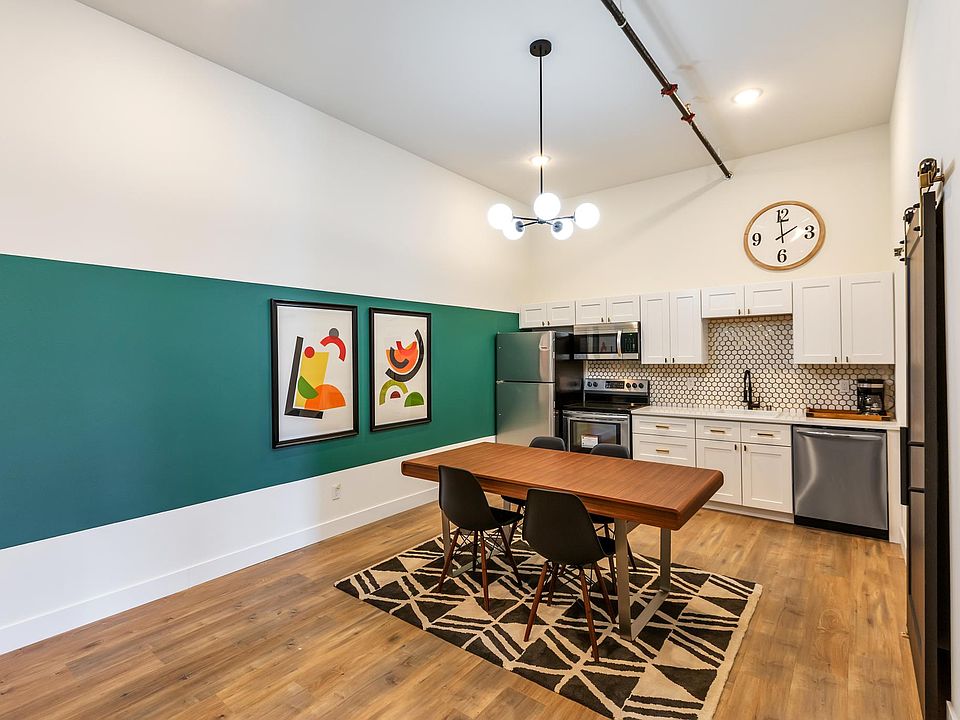 Kitchen with designer tile and new stainless appliances, Quartz counter tops