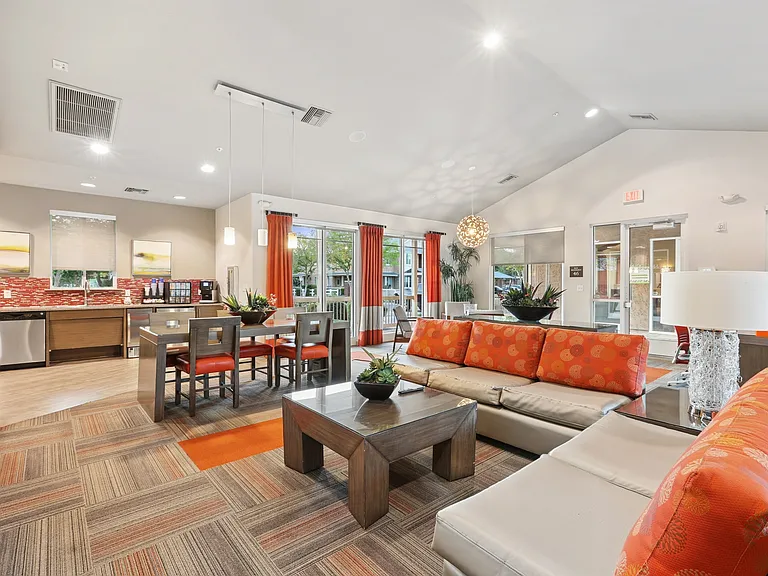 Welcome to Highland Groves at Morrison Ranch, where modern design meets comfort in our spacious community lounge. Enjoy beautiful decor and inviting spaces perfect for relaxation or social gatherings. Schedule your tour today!