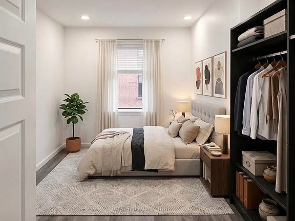 4th image of 227 Christopher Columbus Dr APT 202