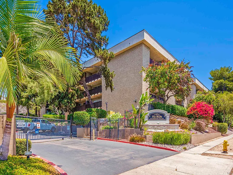 curb view of complex enterance